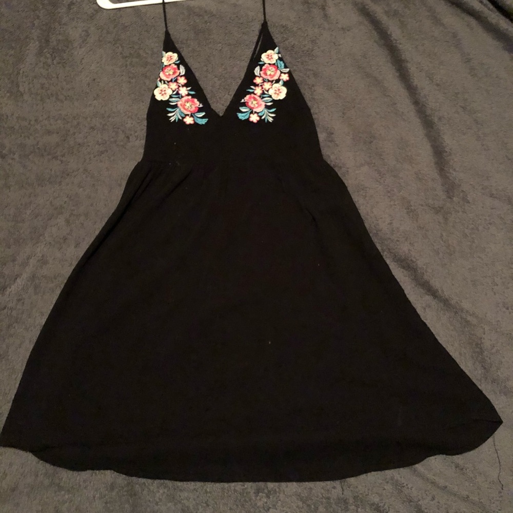 Black dress with floral detail on top